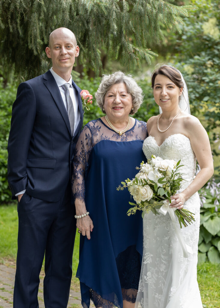 Italian Wedding Photography. Bride and Groom with Bride's Mother image.